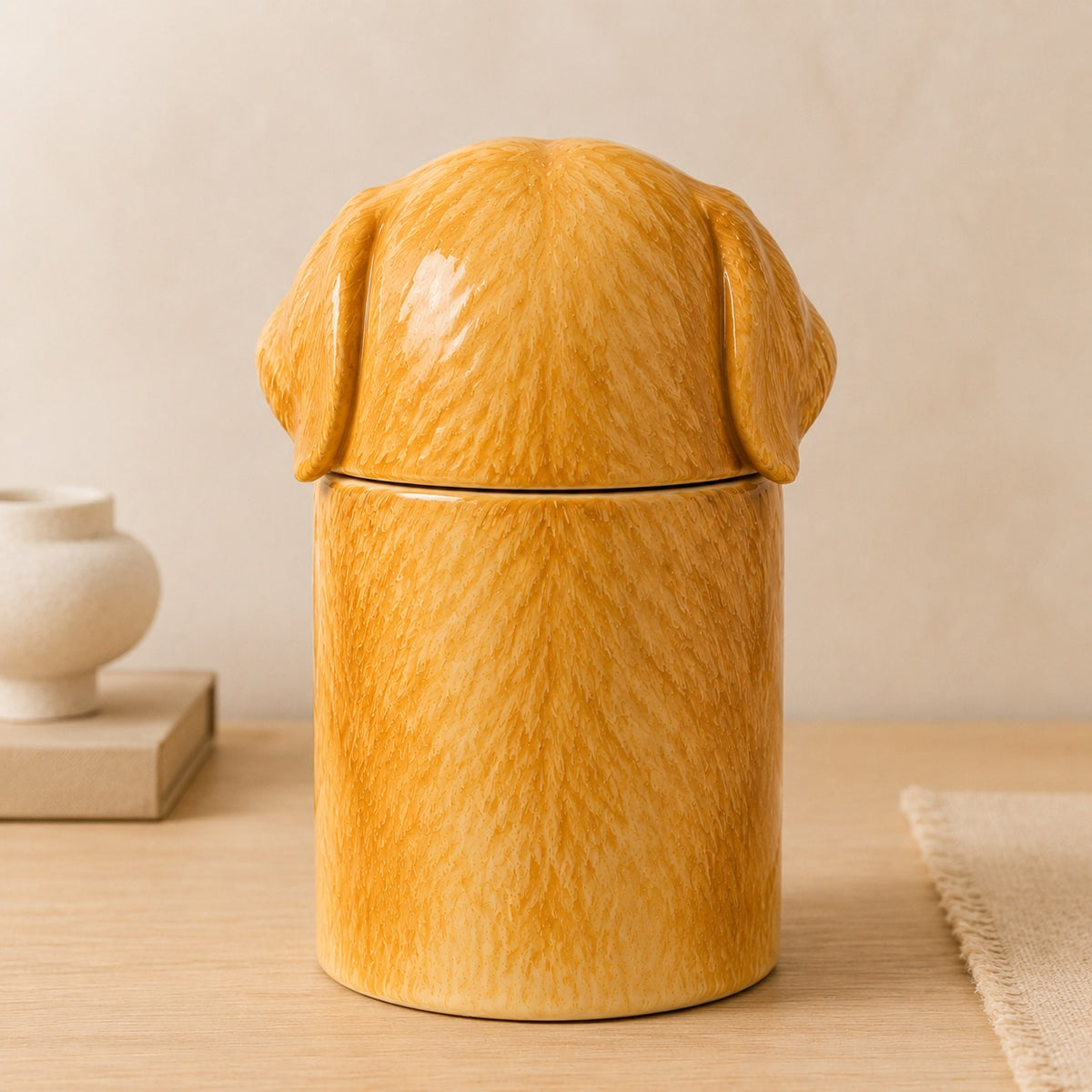 Rear view of a hand-painted ceramic Golden Retriever urn for ashes